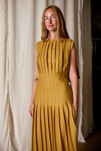 Load image into Gallery viewer, Model wearing column dress in gold