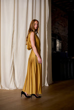 Load image into Gallery viewer, model wearing column dress in gold