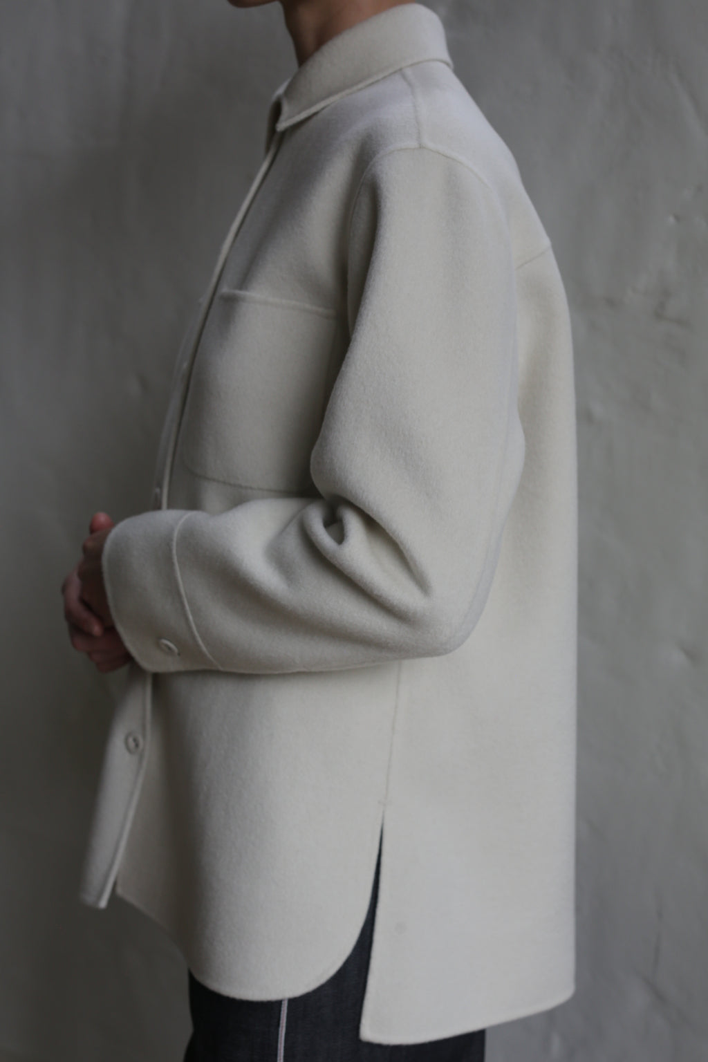 A person wearing the Studio Shirt | Undyed.