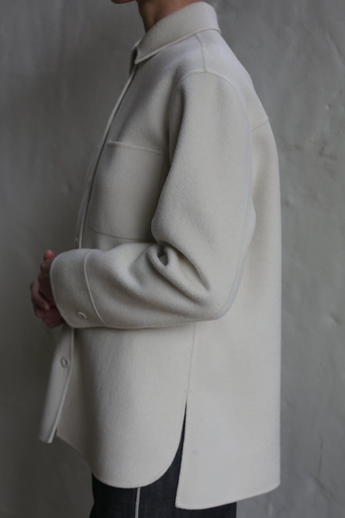 A person wearing the Studio Shirt | Undyed.