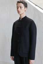 Load image into Gallery viewer, A person wearing the Mandarin Jacket in Watermark Black.