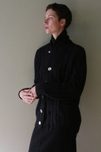 Load image into Gallery viewer, Unisex Shawl-Collar Cable-Knit Cashmere Cardigan in black featuring a shawl collar and a button front.