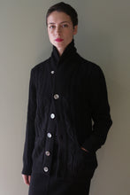 Load image into Gallery viewer, A black Unisex Shawl-Collar Cable-Knit Cashmere Cardigan with a button front.