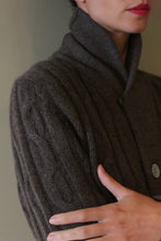 Load image into Gallery viewer, Close-up of a Unisex Shawl-Collar Cable-Knit Cashmere Cardigan | Taupe, featuring a shawl collar and buttons.
