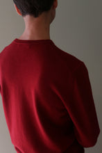 Load image into Gallery viewer, Back view of a person wearing a burgundy High V-Neck Cashmere Sweater with a crew neckline.