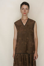 Load image into Gallery viewer, A person with short dark hair wears the V Neck Tank Reversible | Xiang Yun Silk Lingering Fragrance dress. They stand against a plain beige background, looking directly at the camera with a neutral expression.