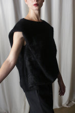 Load image into Gallery viewer, A person wearing the Salento | Black structured vest and black pants stands against a white curtain, their outfit featuring a textured, fuzzy appearance.