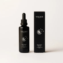 Load image into Gallery viewer, A dark bottle labeled &quot;Recovery Night Oil&quot; with a dropper and a matching box. Both feature an elegant moon and stars design. The box proudly states &quot;100% ORGANIC &amp; ECO MARINE ALGAE.&quot; Combining phytonutrients and rose oil, this bio-organic night oil is ideal for nighttime recovery. The plain background accentuates the product packaging.