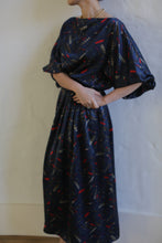 Load image into Gallery viewer, Silk Charmeuse Pleated Wrap Skirt | Feather Print Navy