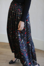 Load image into Gallery viewer, Silk Charmeuse Pleated Wrap Skirt | Feather Print Black